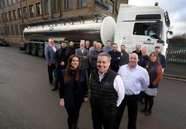 Oscrete Director Scott Wilson (front centre) is joined by the sales, lab and customer services teams at the company’s Bradford HQ to mark 40 years in business