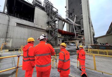 Lord Callanan being shown around Rugby cement works
