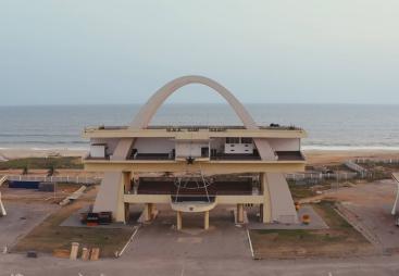 An aerial photo of a modernist concrete building in Africa