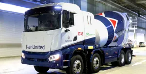 Singapore’s first electric-powered concrete truckmixer painted in Pan-United’s signature red and blue