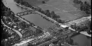 A black and white aerial photo of an under construction bridge