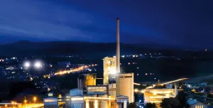 A night time photo of the Jura Cement Plant, Wildegg, Switzerland, which produces approximately 1 million tonnes of cement for the Swiss market and is a leader in the use of alternative fuels.