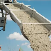 Concrete being unloaded from a concrete mixer