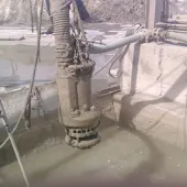 A dewatering pump in a slurry pit