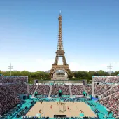 The Eiffel Tower with a Paris 2024 Olympic tennis court in the foreground