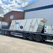 A flat bed lorry transporting an aggregate crusher