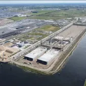 An aerial view of a large industrial dock with construction work taking place