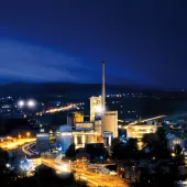 A night time photo of the Jura Cement Plant, Wildegg, Switzerland, which produces approximately 1 million tonnes of cement for the Swiss market and is a leader in the use of alternative fuels.