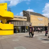 A view of the Queen Elizabeth Hall at the Southbank Centre, with it's distinctive yellow, spiral staircase.