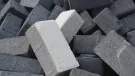 A close-up view of a pile of concrete blocks