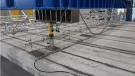 Hollowcore concrete beams under pressure in a laboratory