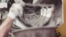 Concrete being poured from a mixer into a container. A dynamic action image shows wet concrete being dispensed from a mixer into a container, capturing the essence of construction work and the creation of solid foundations in building projects.